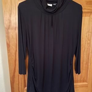 New York and company. Black. Turtle neck with hole pattern in center